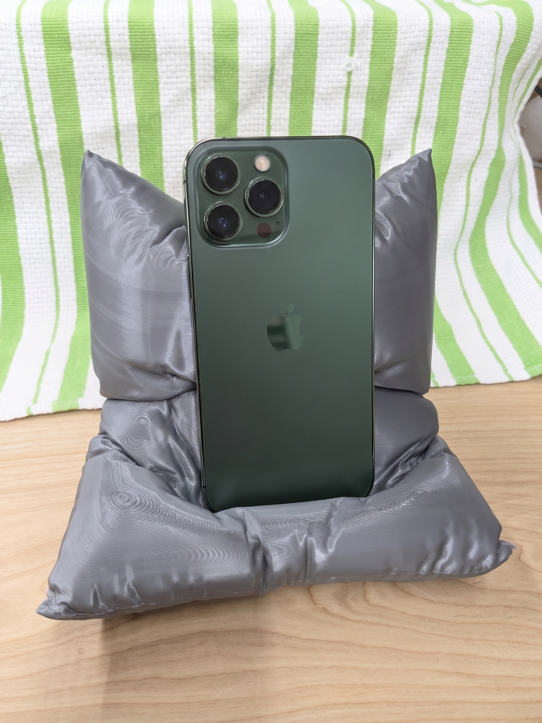 Phone propped up in the Assista phone holder